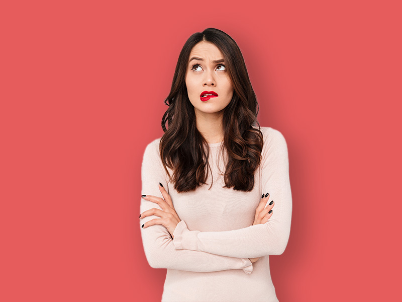 Overwhelmed client with hands crossed looking stressed